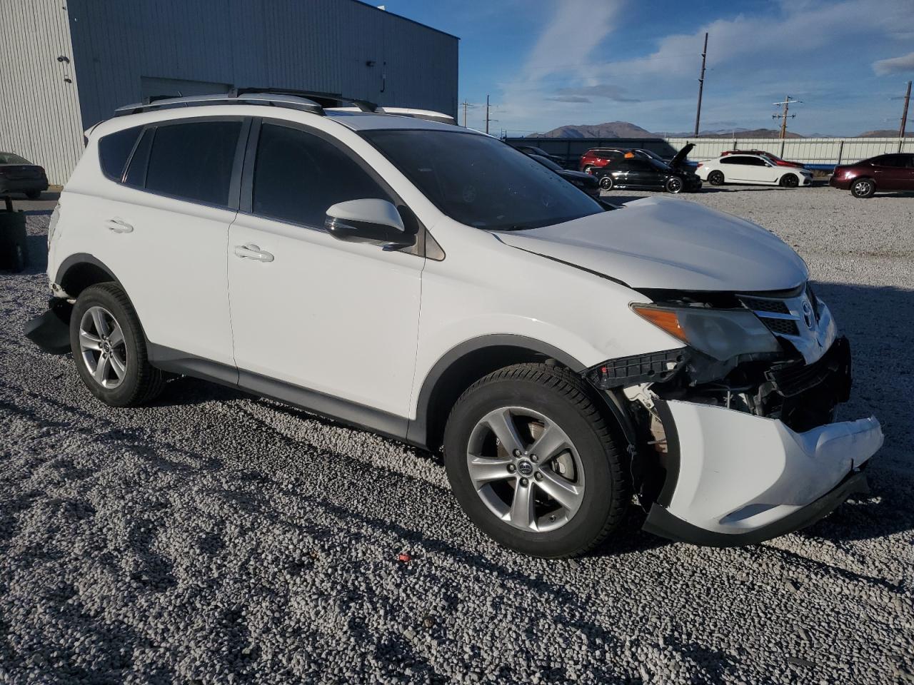 2015 Toyota RAV 4 VIN 2T3RFREV2FW391865 Copart auction photo, front end damage thumbnail 4