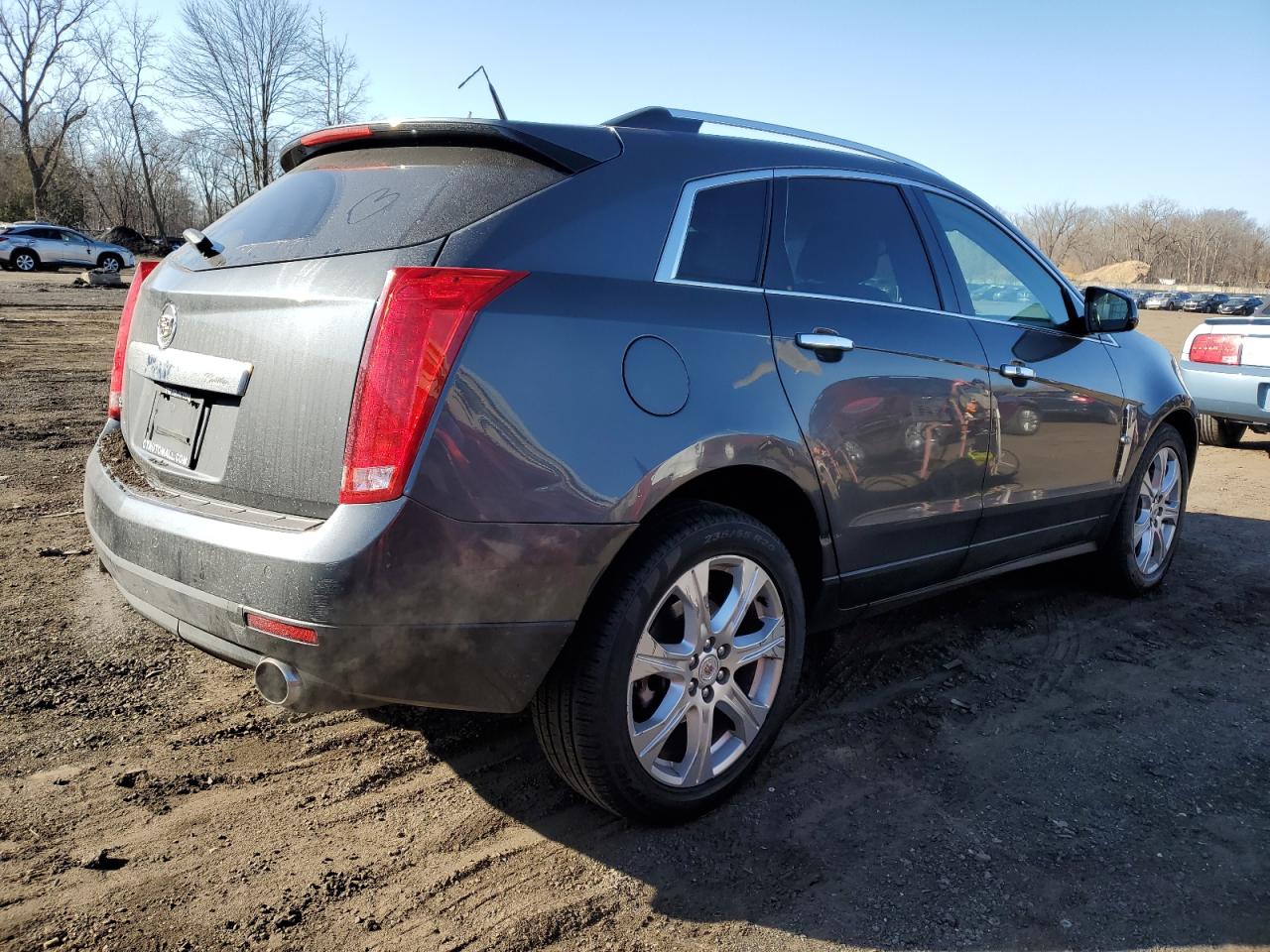 2011 Cadillac SRX VIN 3GYFNEEY4BS512082 Copart auction photo, front end / side damage thumbnail 3