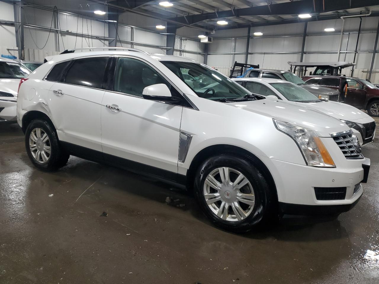 2015 Cadillac SRX VIN 3GYFNEE35FS537745 Copart auction photo, side damage thumbnail 4