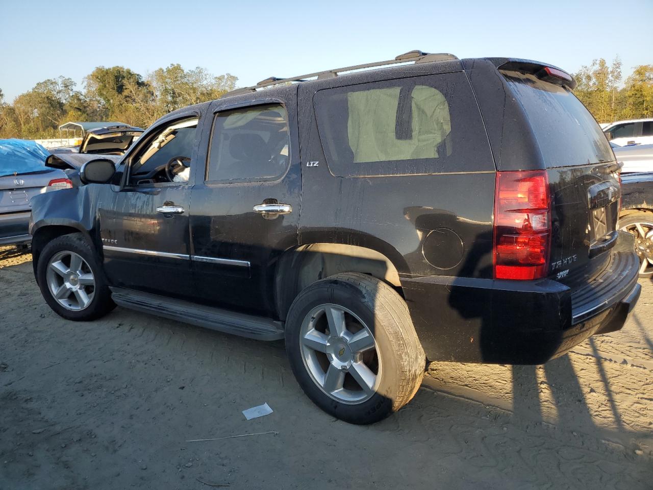 2011 Chevrolet Tahoe VIN 1GNSCCE00BR271382 Copart auction photo, front end / minor dent/scratches damage thumbnail 2
