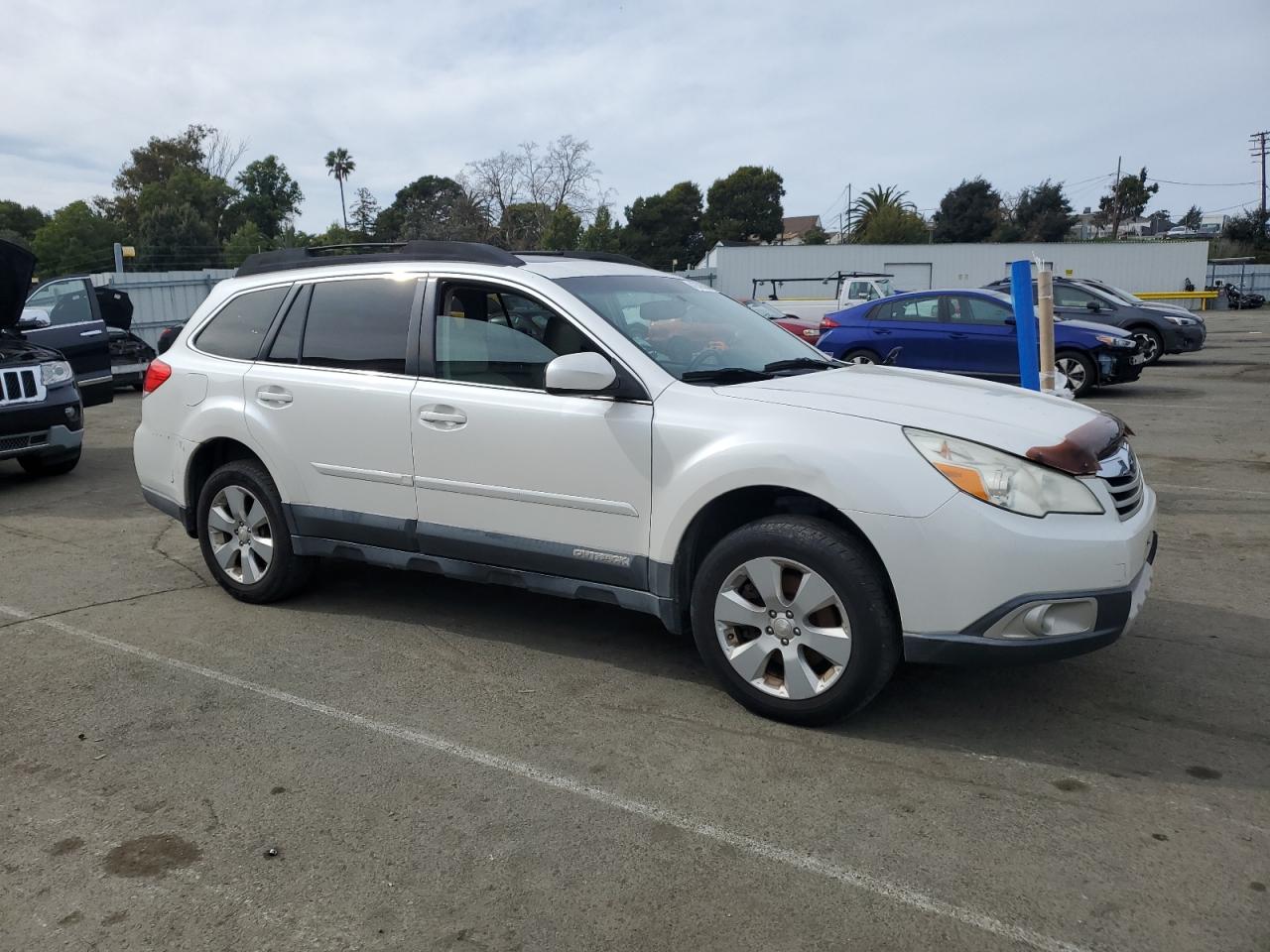 2011 Subaru Outback VIN 4S4BREKC3B2390128 Copart auction photo, all over / minor dent/scratches damage thumbnail 4