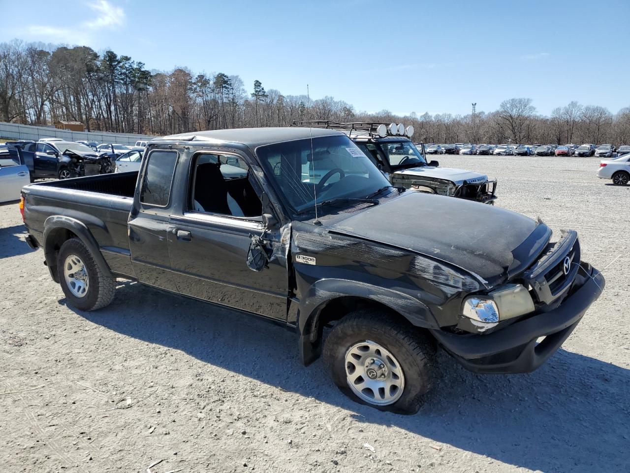 2001 Mazda B-series VIN 4F4YR16V21TM32517 Copart auction photo, all over damage thumbnail 4