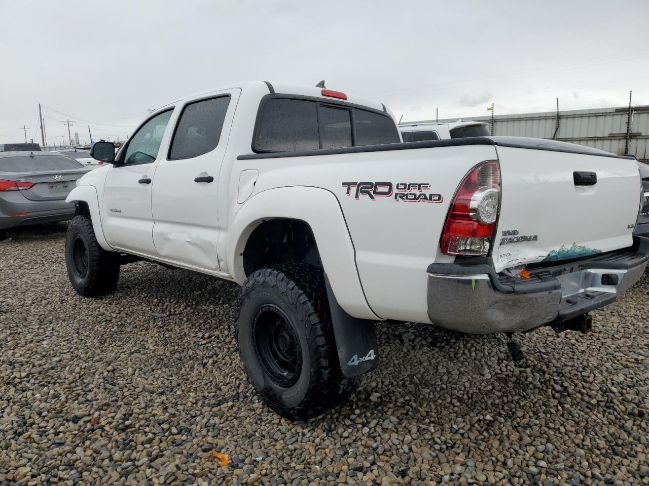 2015 Toyota Tacoma VIN 3TMLU4ENXFM184060 Copart auction photo, front end / side damage thumbnail 2