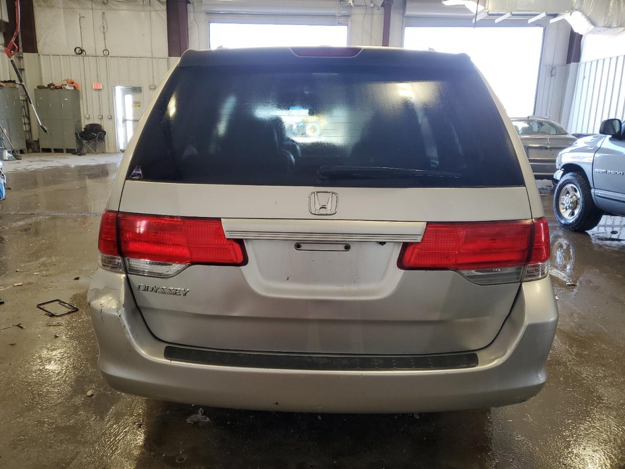 2009 Honda Odyssey VIN 5FNRL387X9B055667 Copart auction photo, front end / side damage thumbnail 6