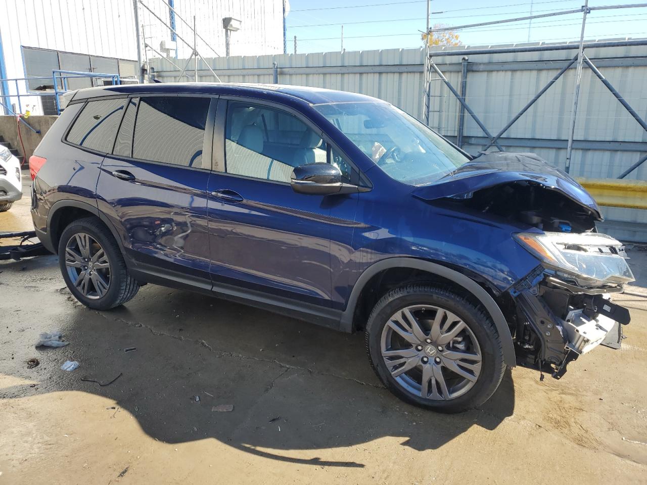 2019 Honda Passport VIN 5FNYF8H5XKB010717 Copart auction photo, front end / side damage thumbnail 4