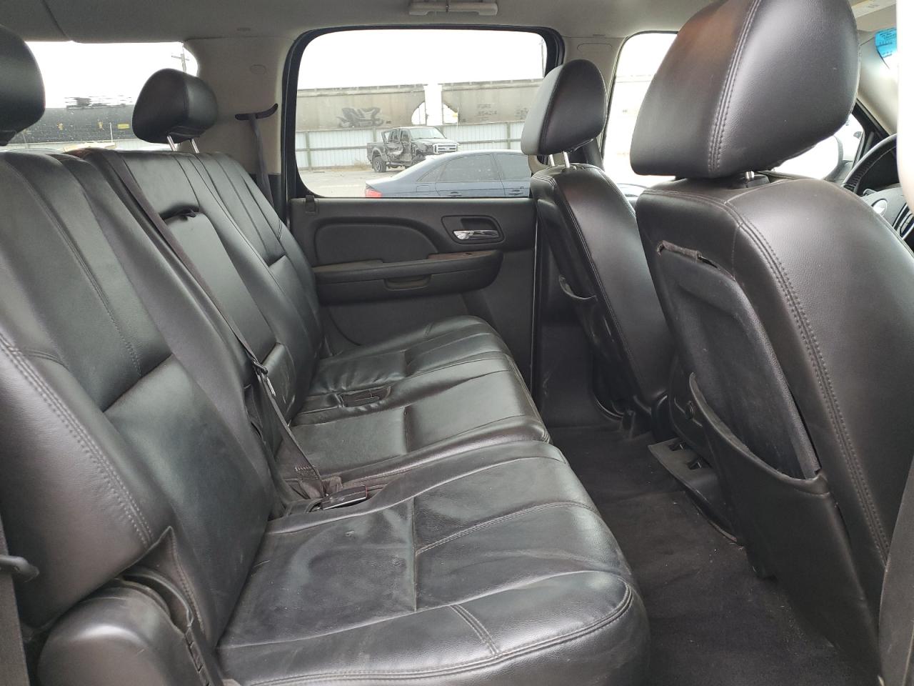 2009 Chevrolet Suburban VIN 1GNFK26349R255803 Copart auction photo, front end / side damage thumbnail 11