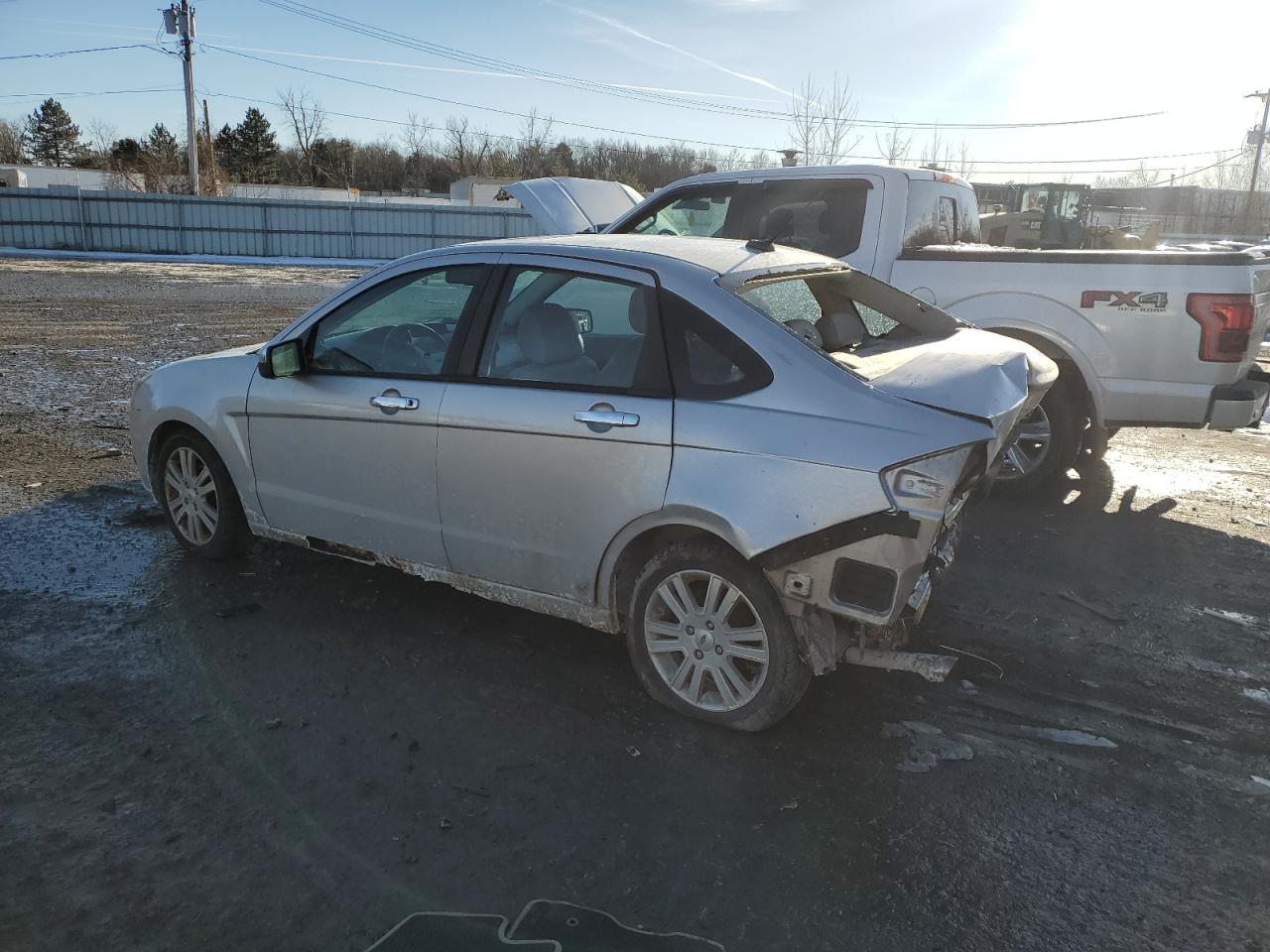 2011 Ford Focus VIN 1FAHP3HN2BW192690 Copart auction photo, rear end damage thumbnail 2
