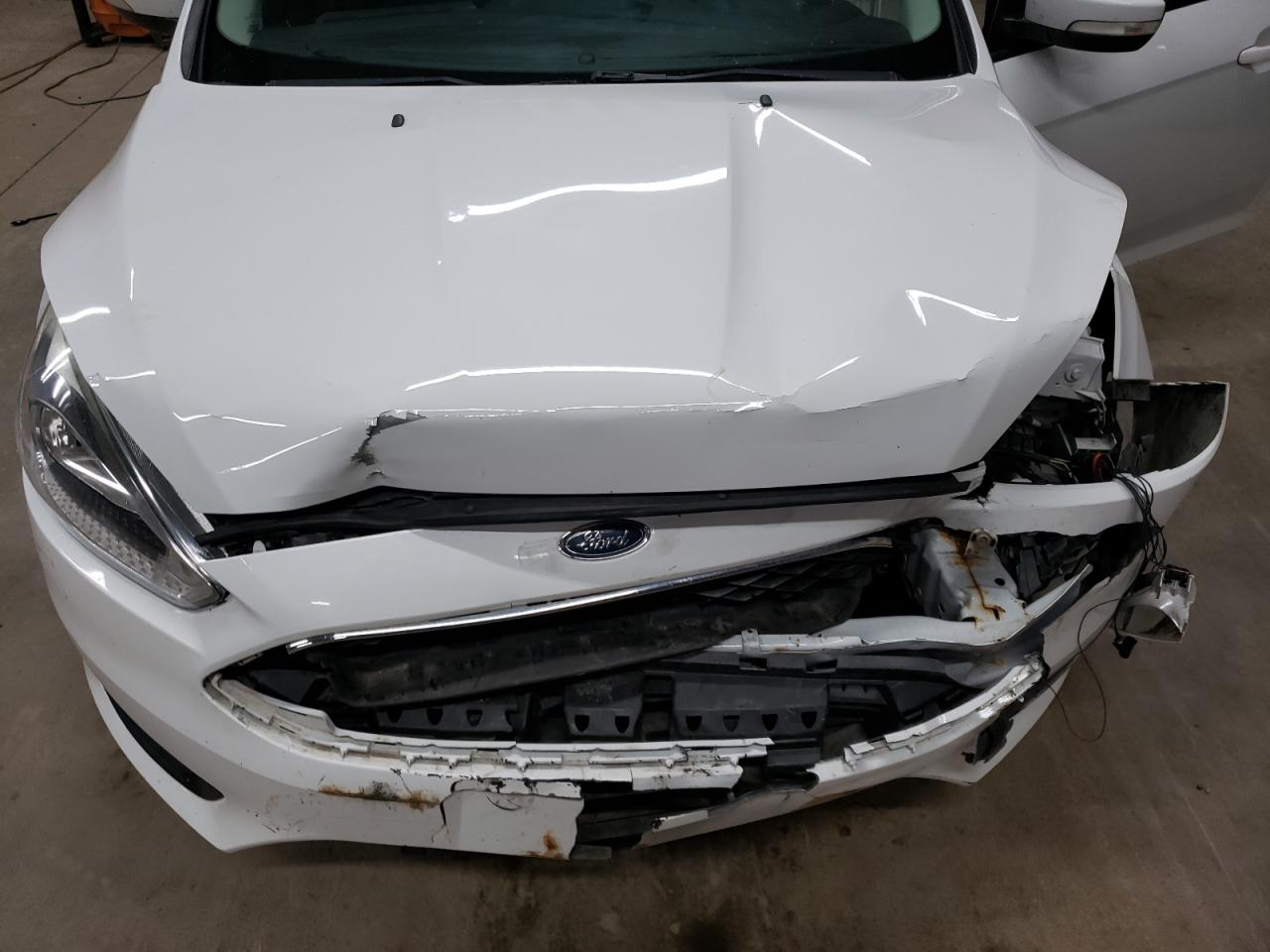 2016 Ford Focus VIN 1FADP3F2XGL370099 Copart auction photo, front end / side damage thumbnail 11