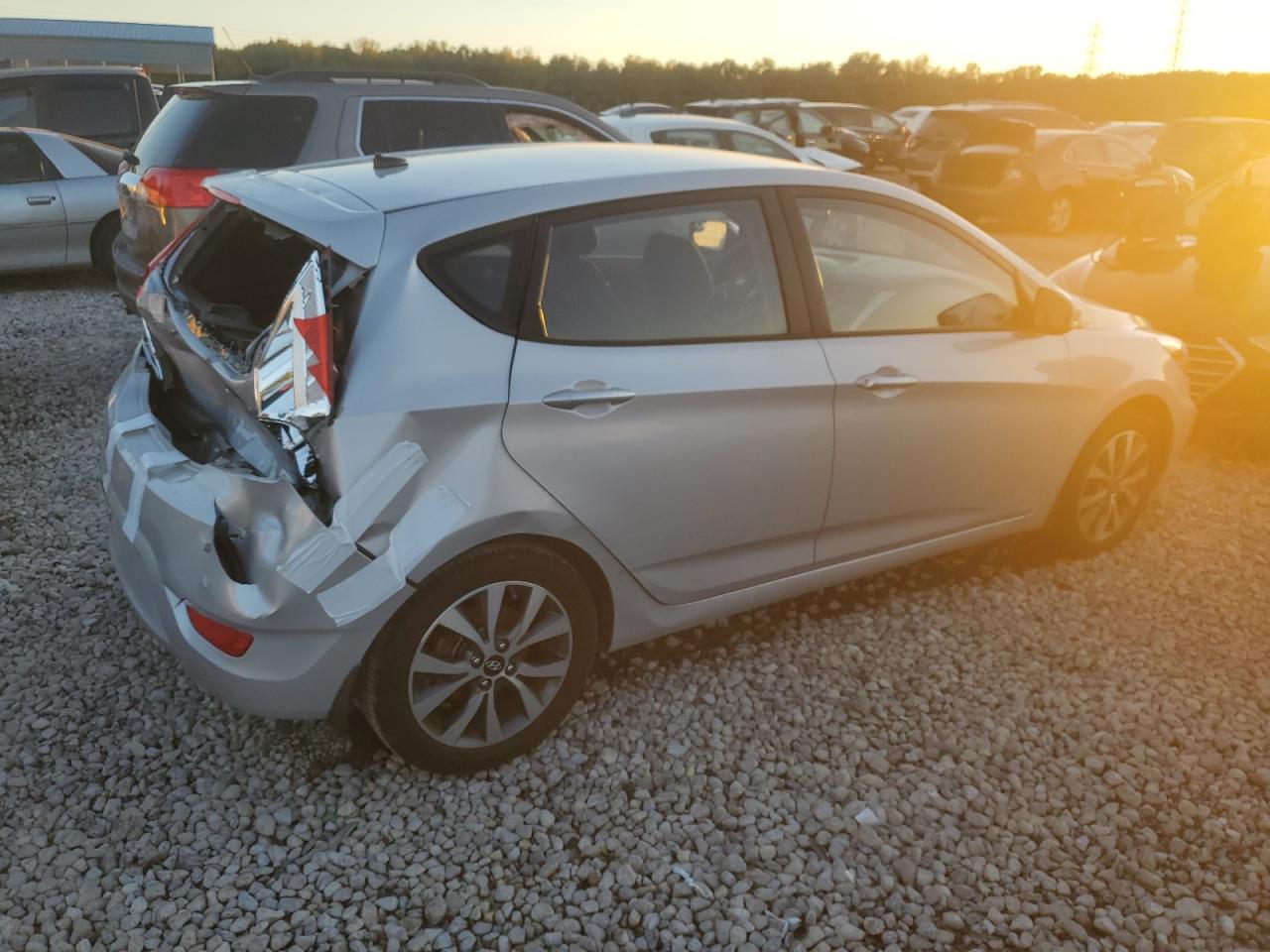 2015 Hyundai Accent VIN KMHCU5AEXFU233647 Copart auction photo, all over damage thumbnail 3