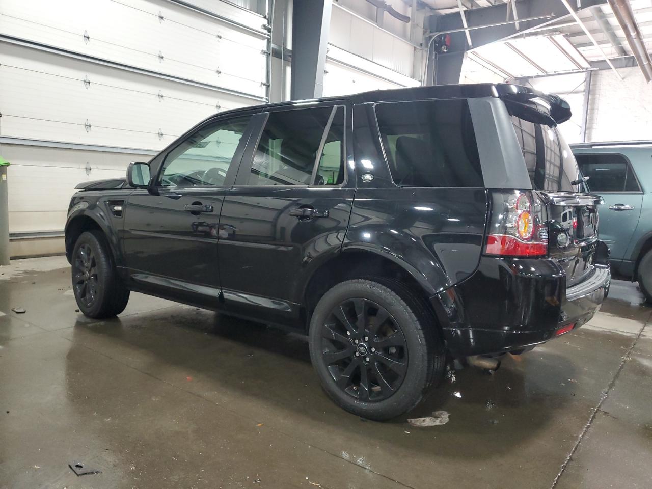 2015 Land Rover LR2 VIN SALFP2BG9FH432472 Copart auction photo, front end damage thumbnail 2