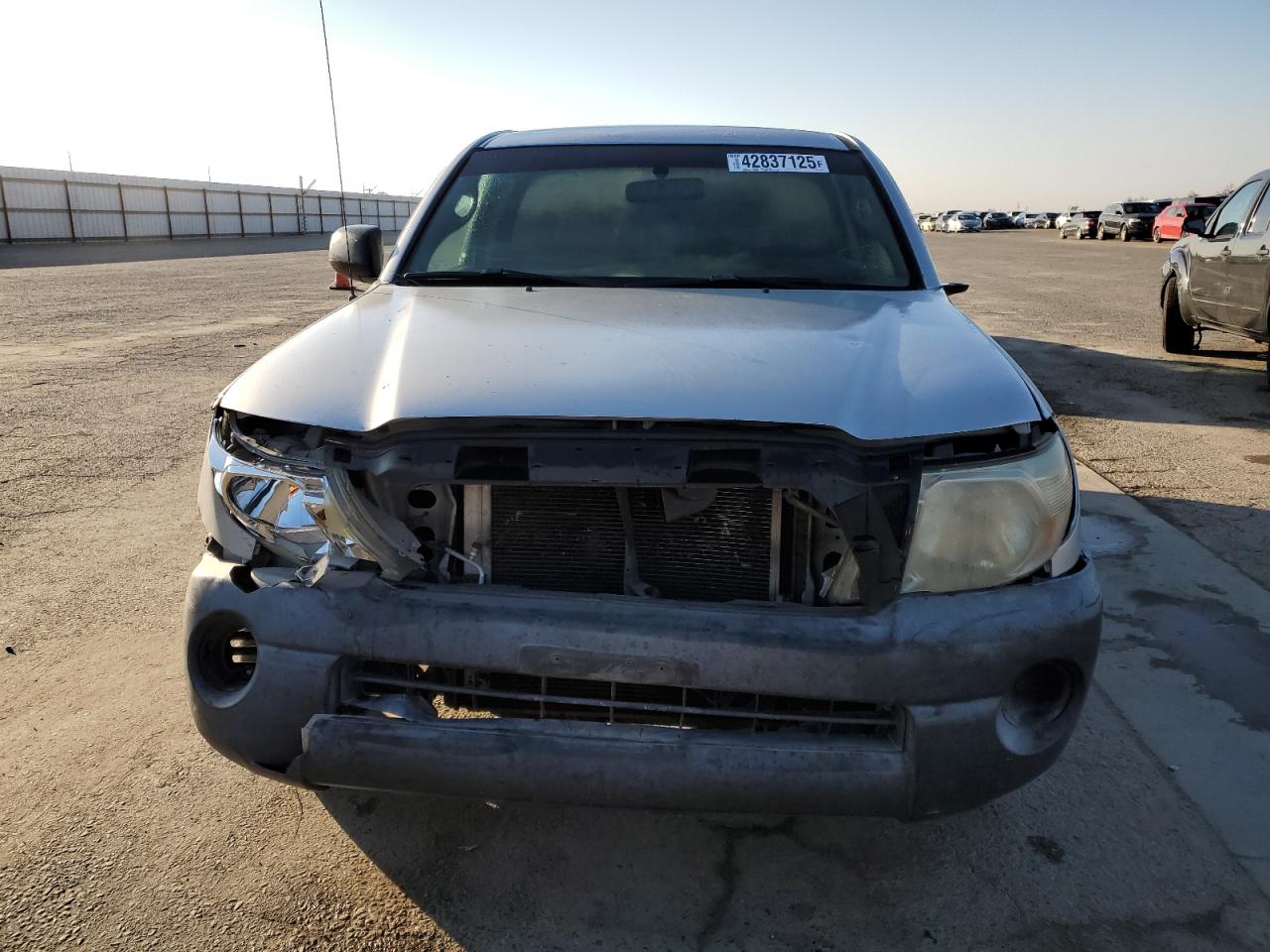 2005 Toyota Tacoma VIN 5TENX22N75Z106703 Copart auction photo, front end / side damage thumbnail 5