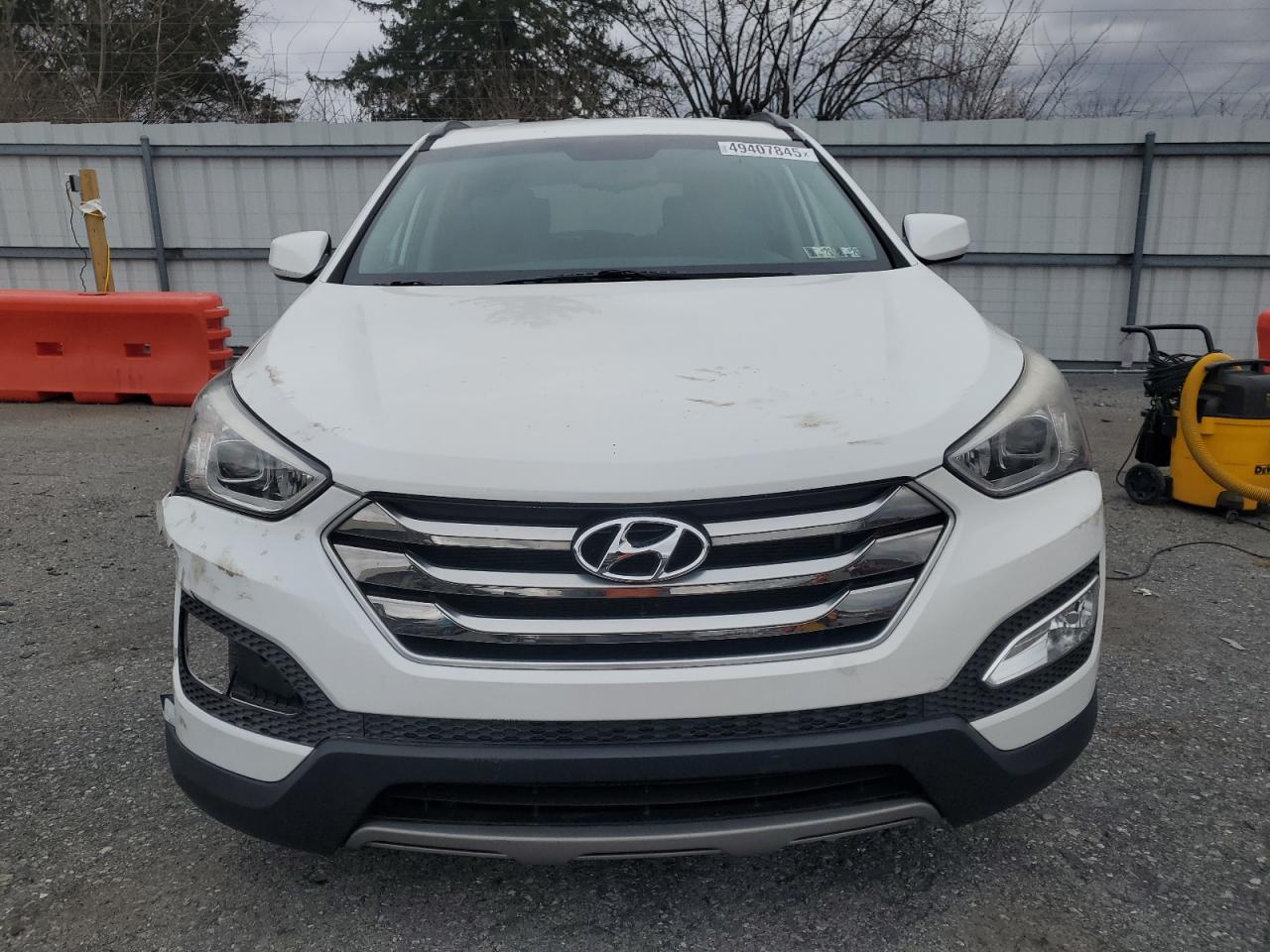 2016 Hyundai Santa Fe VIN 5XYZUDLB3GG347519 Copart auction photo, front end / side damage thumbnail 5