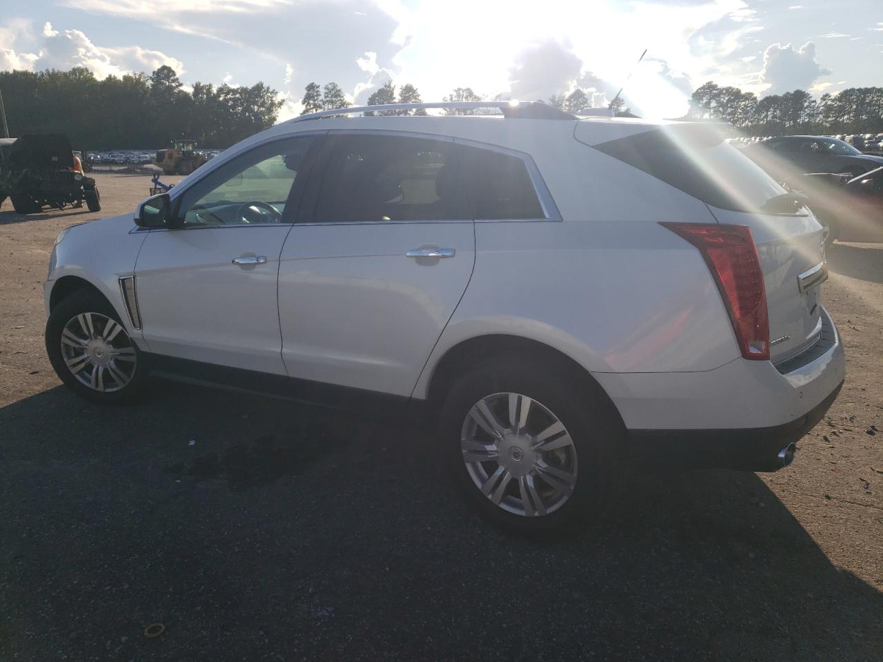 2015 Cadillac SRX VIN 3GYFNEE39FS572773 Copart auction photo, front end damage thumbnail 2
