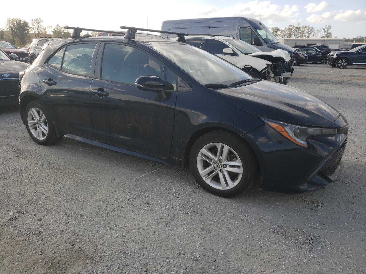 2019 Toyota Corolla VIN JTNK4RBE9K3005690 Copart auction photo, rear end / minor dent/scratches damage thumbnail 4