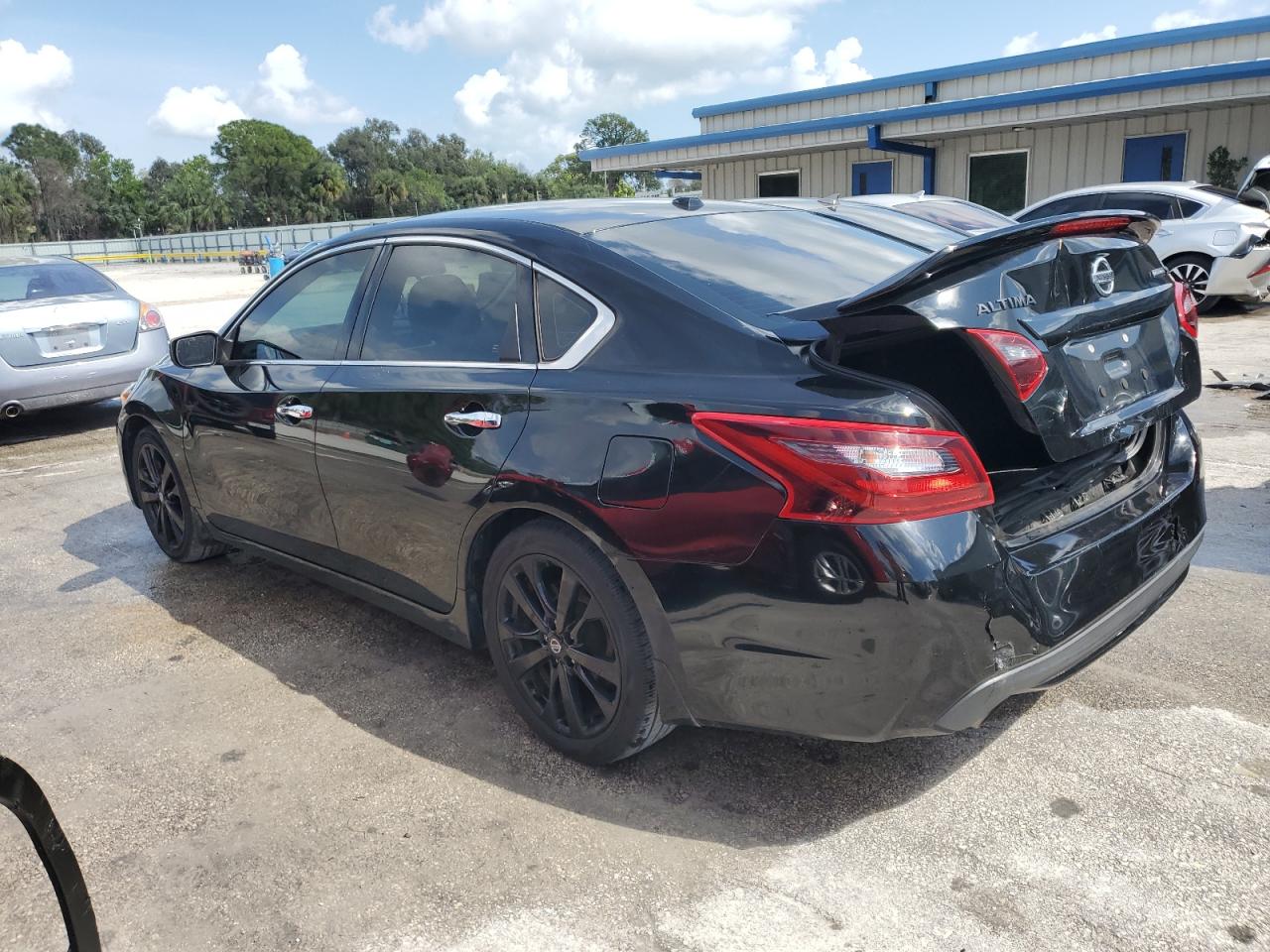 2018 Nissan Altima VIN 1N4AL3AP1JC470939 Copart auction photo, rear end / minor dent/scratches damage thumbnail 2