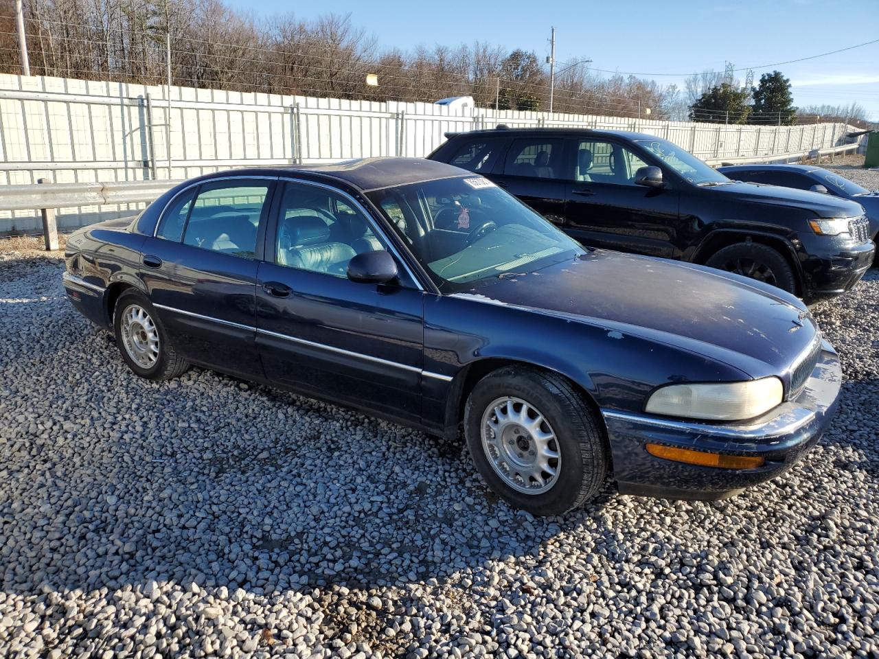 1999 Buick Park Avenue VIN 1G4CW52K7X4639143 Copart auction photo, all over damage thumbnail 4