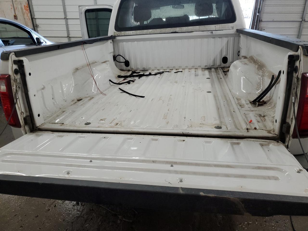 2012 Ford F250 VIN 1FT7X2A63CEB54671 Copart auction photo, side / front end damage thumbnail 10