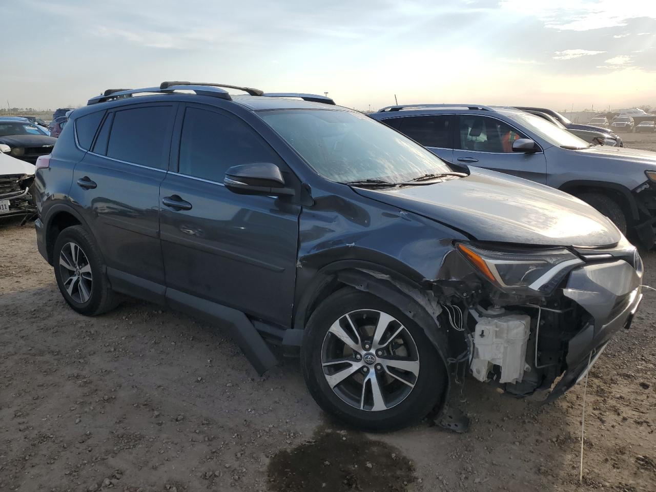 2016 Toyota RAV 4 VIN 2T3WFREV0GW274080 Copart auction photo, front end / minor dent/scratches damage thumbnail 4