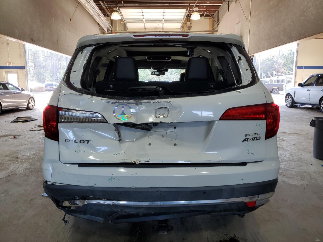 2017 Honda Pilot VIN 5FNYF6H00HB090868 Copart auction photo, rear end / minor dent/scratches damage thumbnail 6
