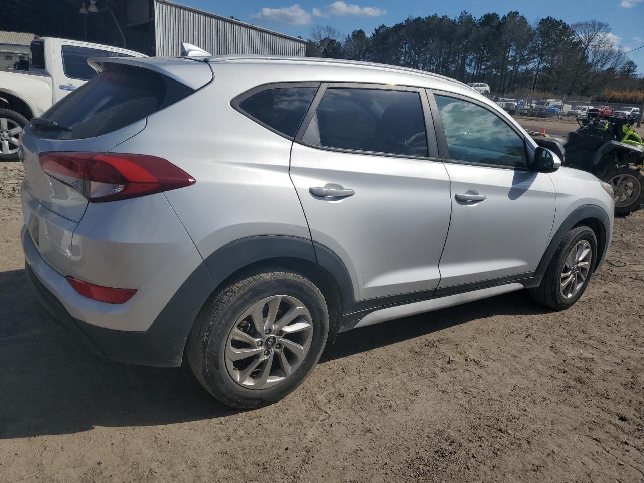 2018 Hyundai Tucson VIN KM8J33A47JU659682 Copart auction photo, side damage thumbnail 3
