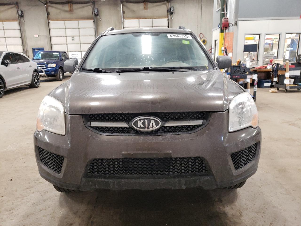2009 KIA Sportage VIN KNDJE723197571927 Copart auction photo, mechanical / rear end damage thumbnail 5