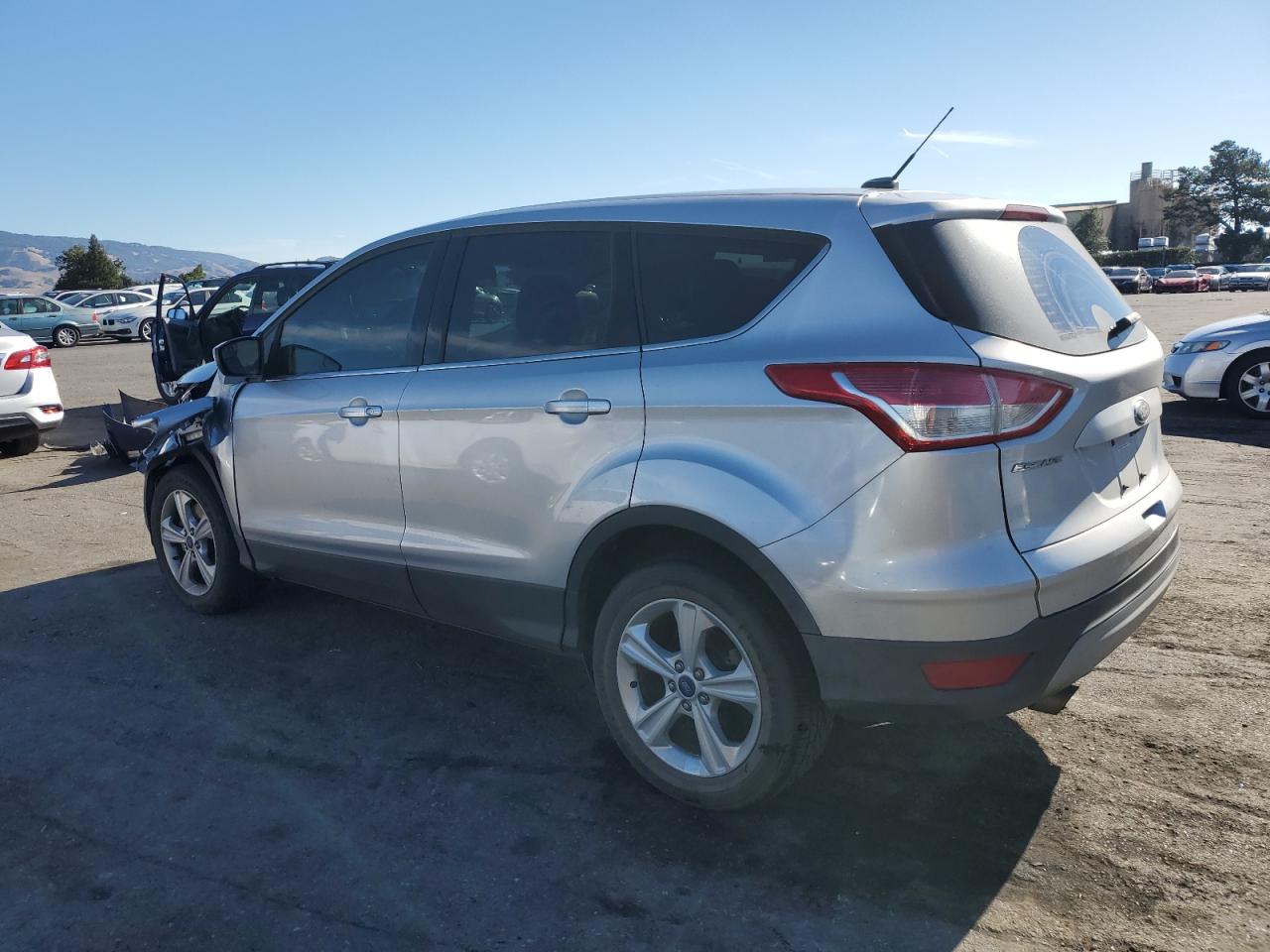 2015 Ford Escape VIN 1FMCU9GX0FUC67709 Copart auction photo, front end damage thumbnail 2