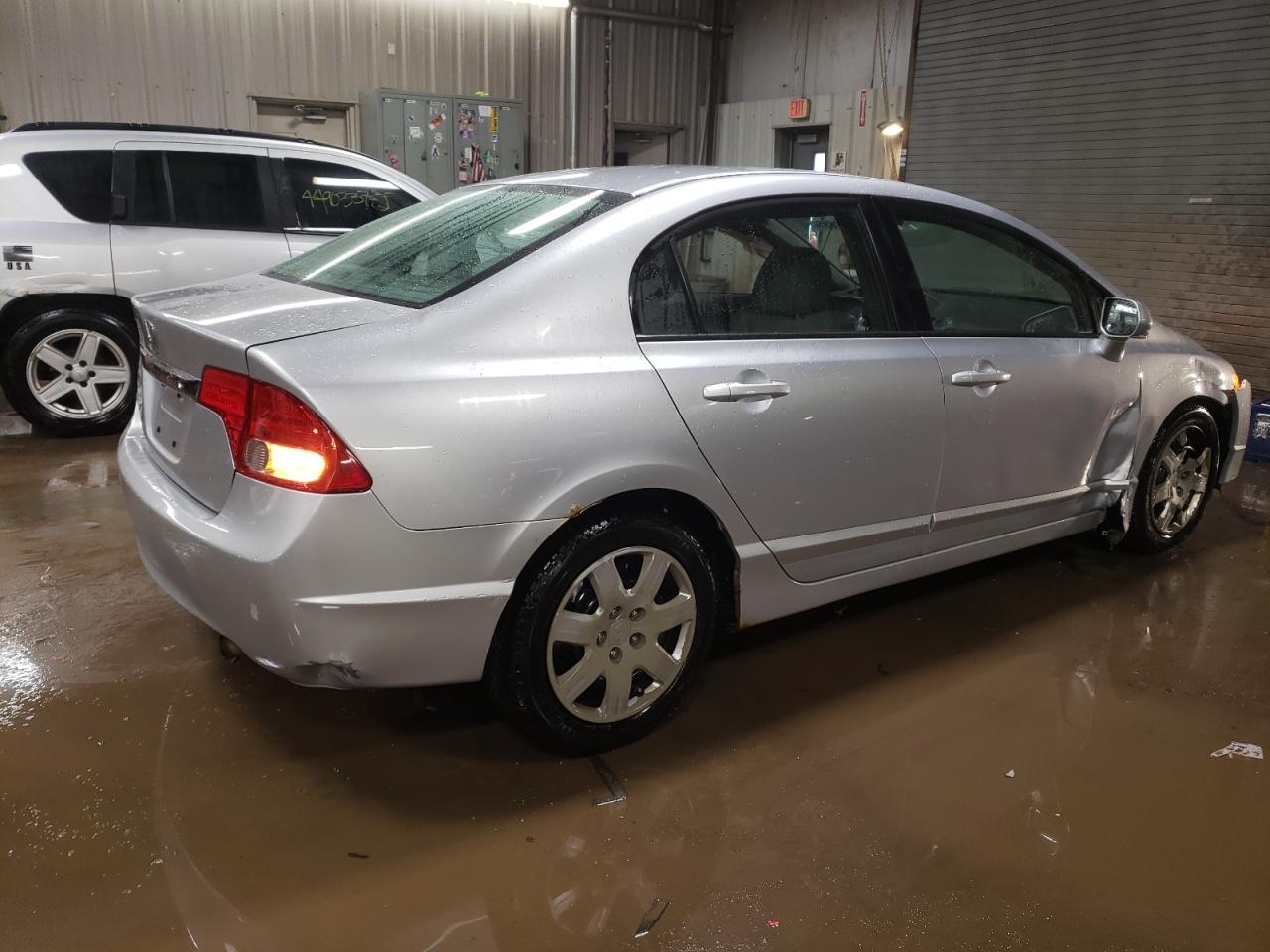 2010 Honda Civic VIN 2HGFA1F55AH300325 Copart auction photo, side / front end damage thumbnail 3