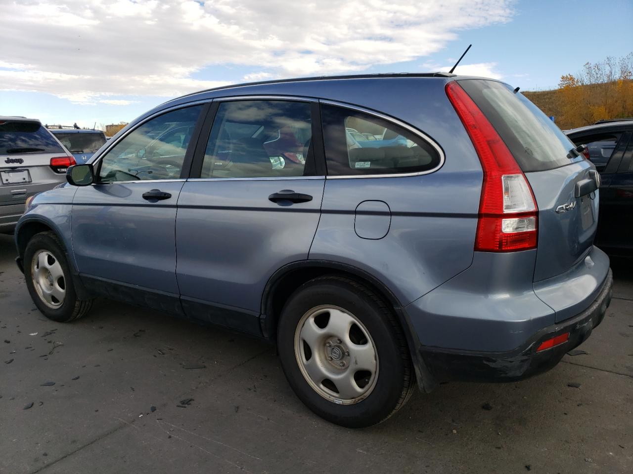 2007 Honda CR-V VIN JHLRE38327C057627 Copart auction photo, side / rear end damage thumbnail 2