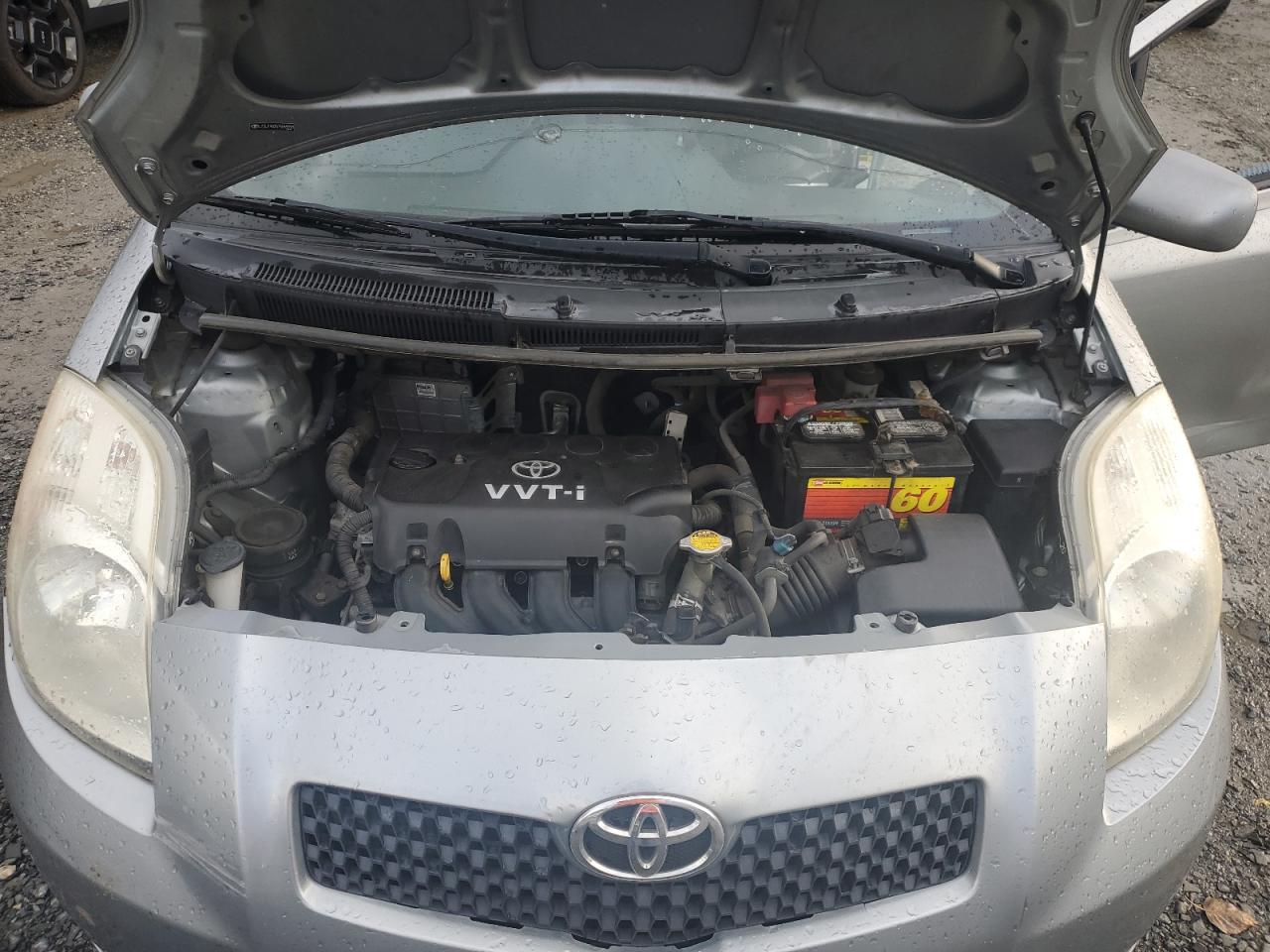 2007 Toyota Yaris VIN JTDJT903575069998 Copart auction photo, side / rear end damage thumbnail 12