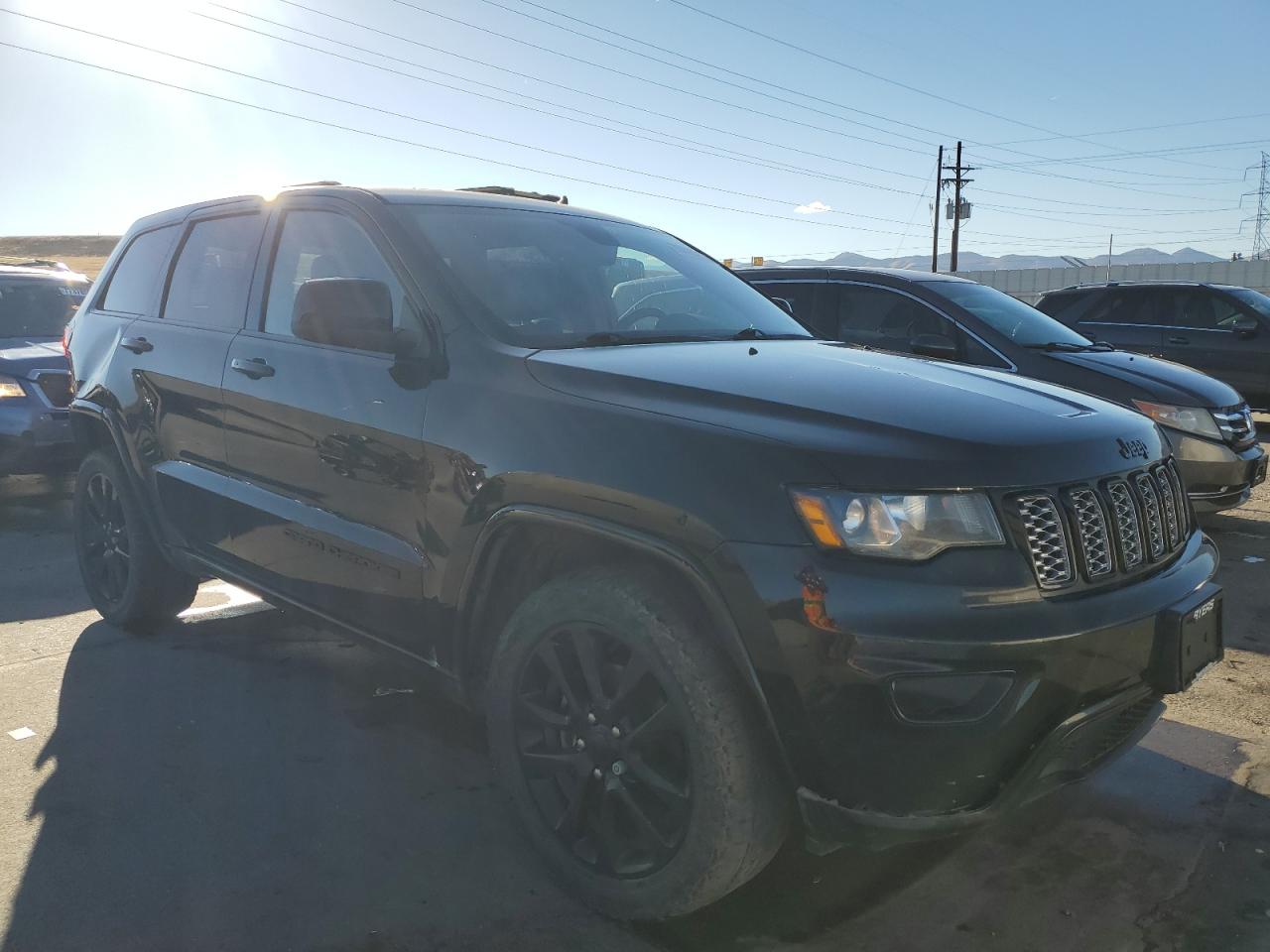 2017 Jeep Grand Cherokee VIN 1C4RJFAG6HC824873 Copart auction photo, rear end / side damage thumbnail 4