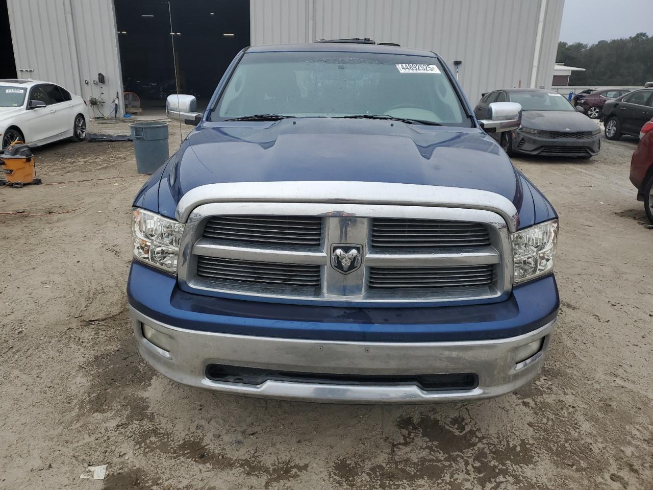 2009 Dodge RAM VIN 1D3HB13T49J513131 Copart auction photo, rear end damage thumbnail 5