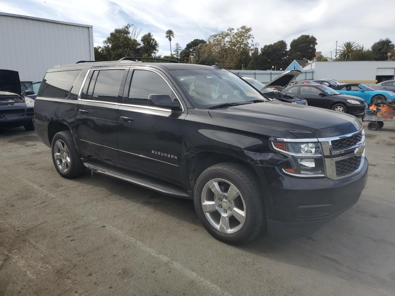 2019 Chevrolet Suburban VIN 1GNSCGKC2KR297407 Copart auction photo, all over damage thumbnail 4