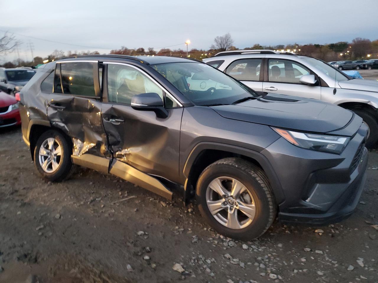 2022 Toyota RAV 4 VIN 2T3P1RFVXNC285622 Copart auction photo, front end / side damage thumbnail 4