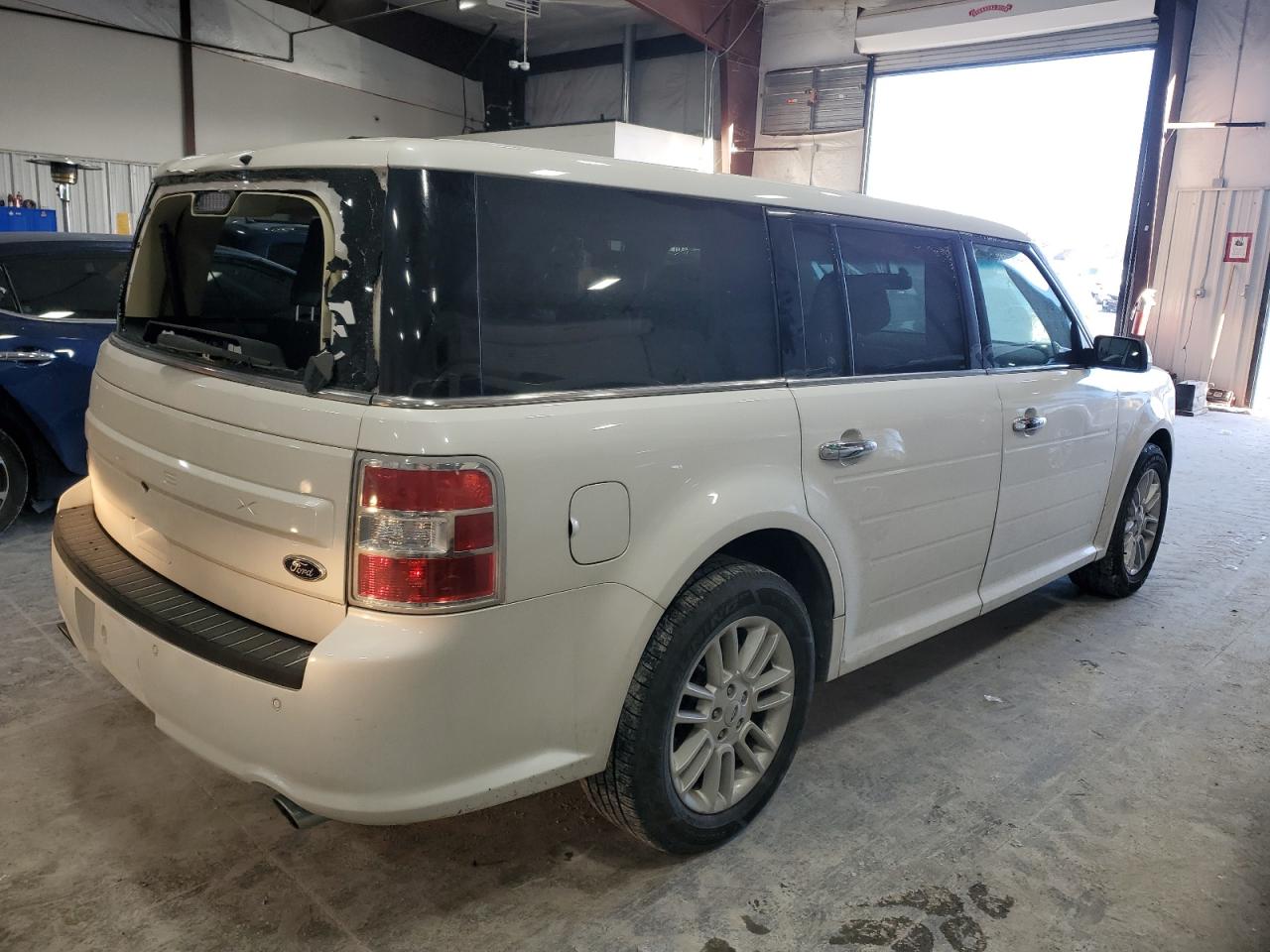 2015 Ford Flex VIN 2FMGK5C86FBA19517 Copart auction photo, top/roof / front end damage thumbnail 3