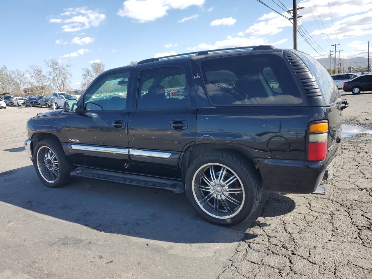 2004 GMC Yukon VIN 1GKEC13V44R263849 Copart auction photo, rear end / minor dent/scratches damage thumbnail 2