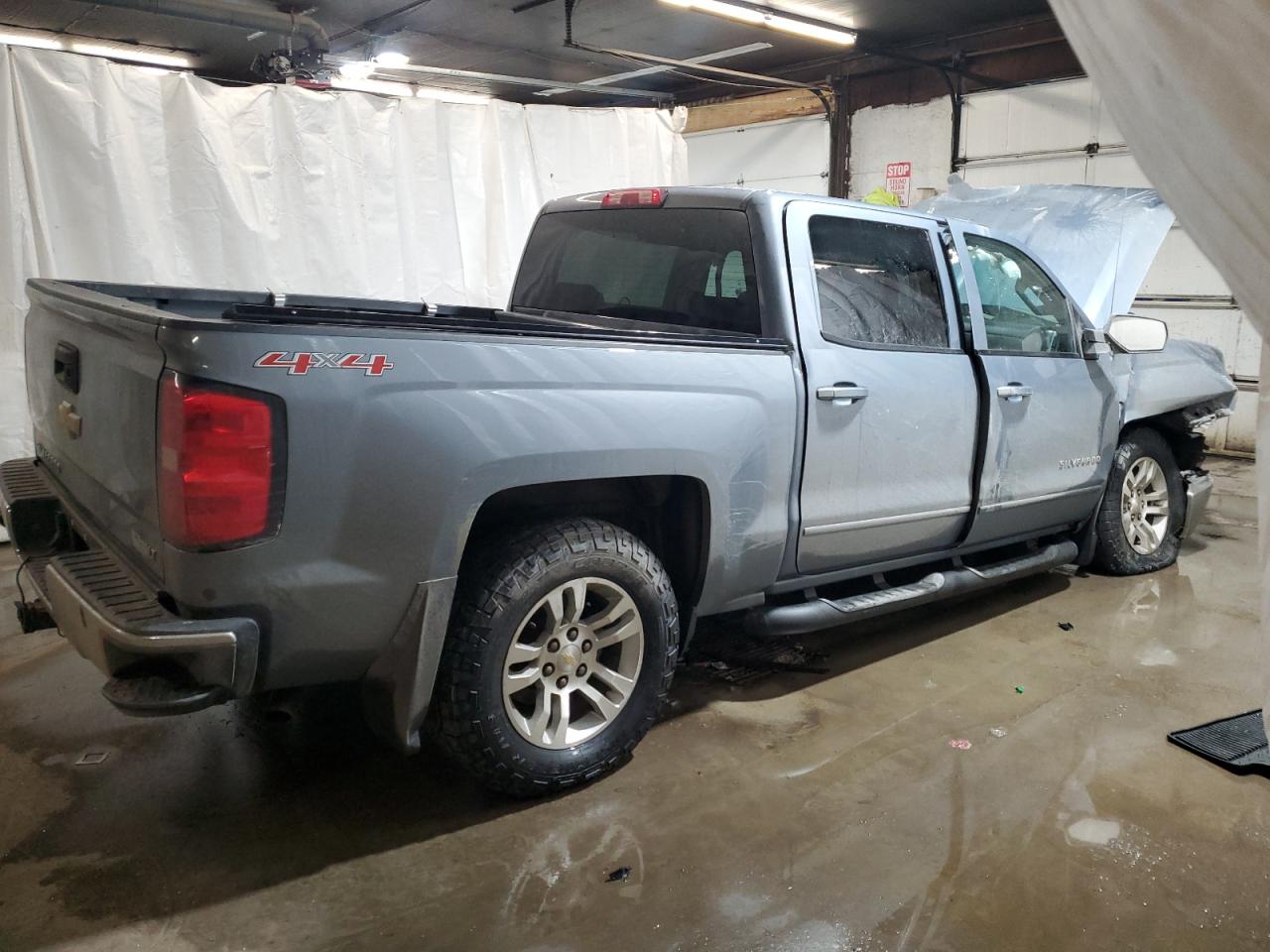 2015 Chevrolet Silverado VIN 3GCUKREC7FG337868 Copart auction photo, front end / side damage thumbnail 3