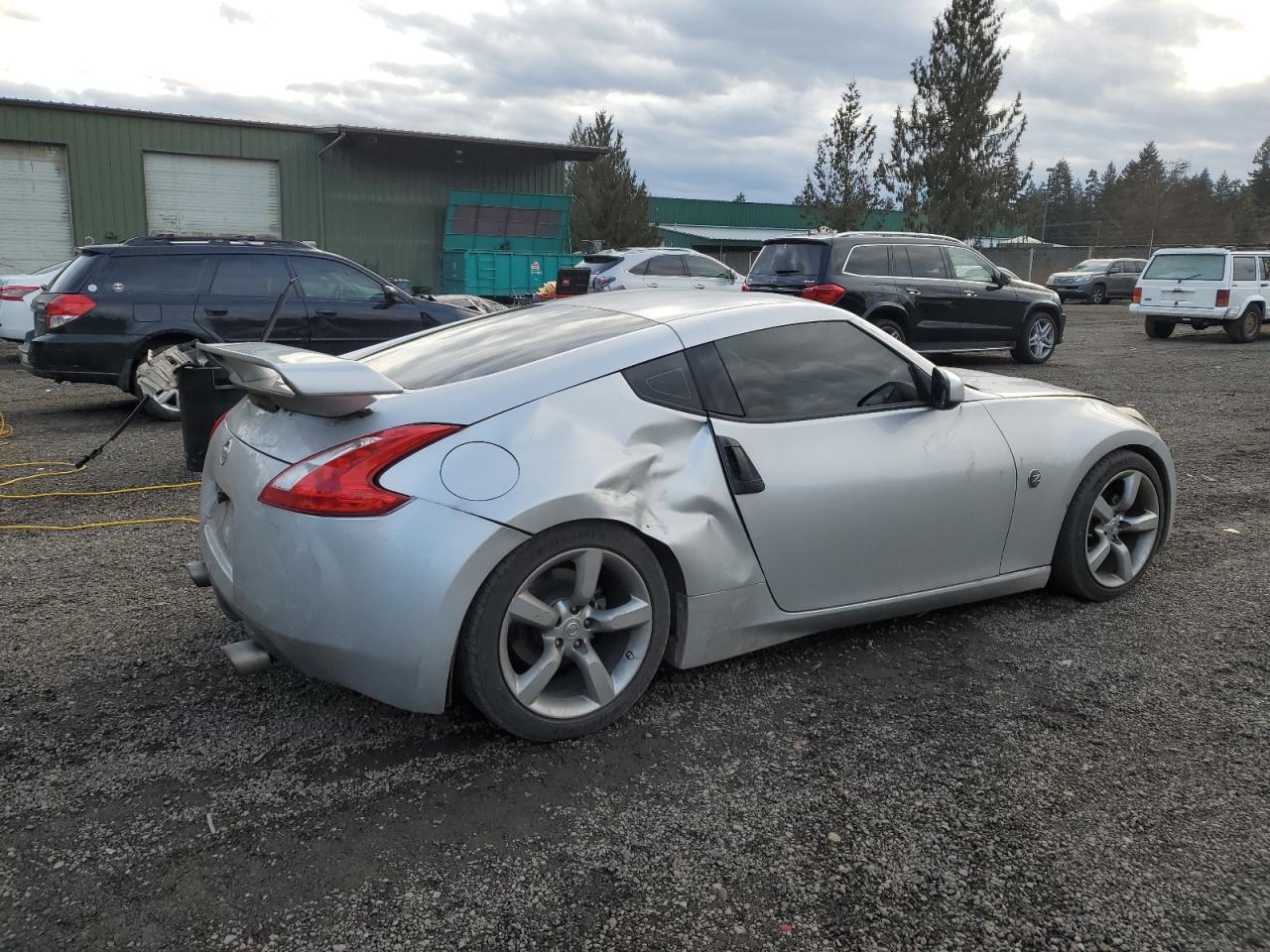 2009 Nissan 370Z VIN JN1AZ44E99M400557 Copart auction photo, rear end damage thumbnail 3