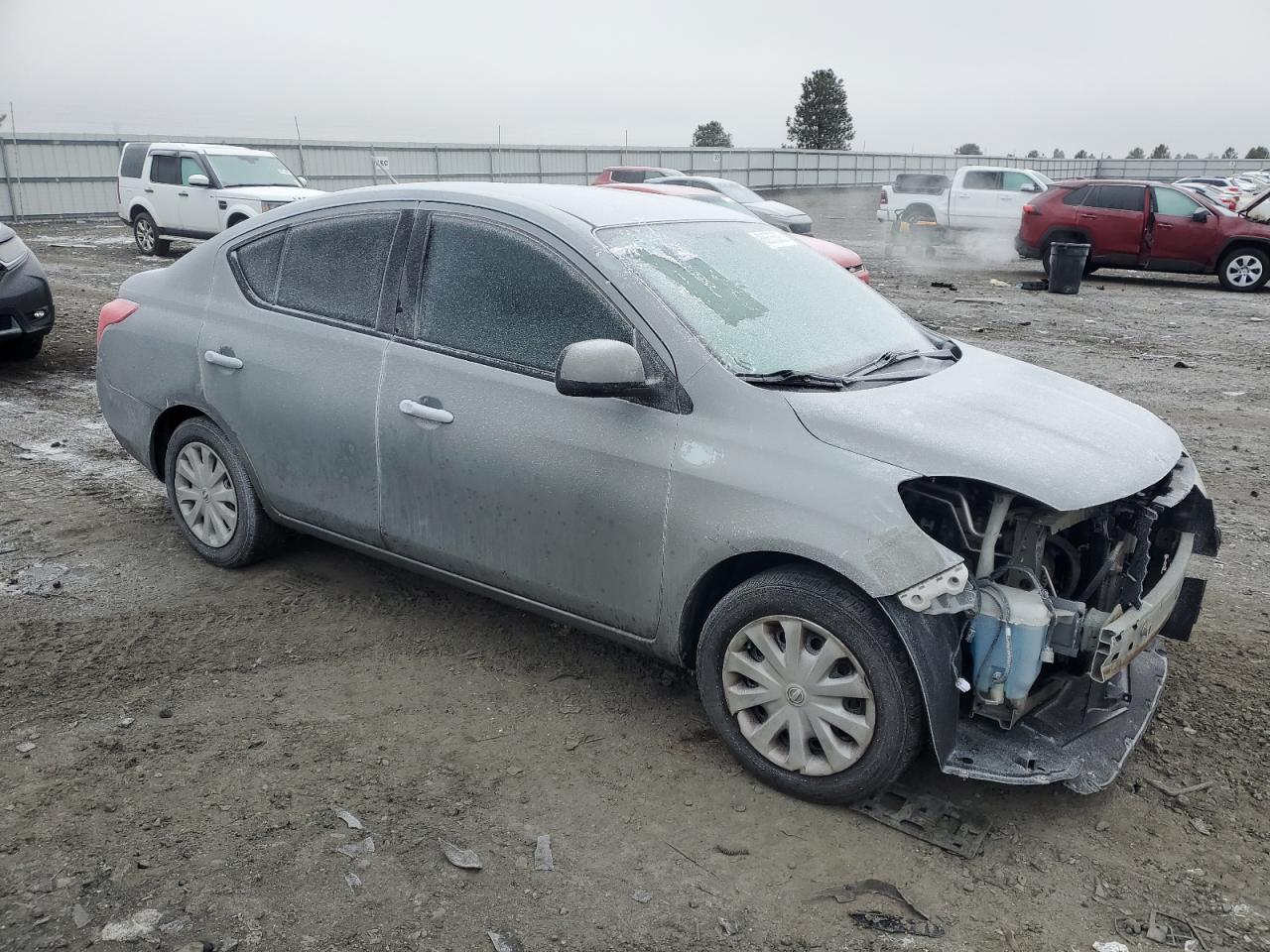 2012 Nissan Versa VIN 3N1CN7AP7CL812084 Copart auction photo, front end / side damage thumbnail 4