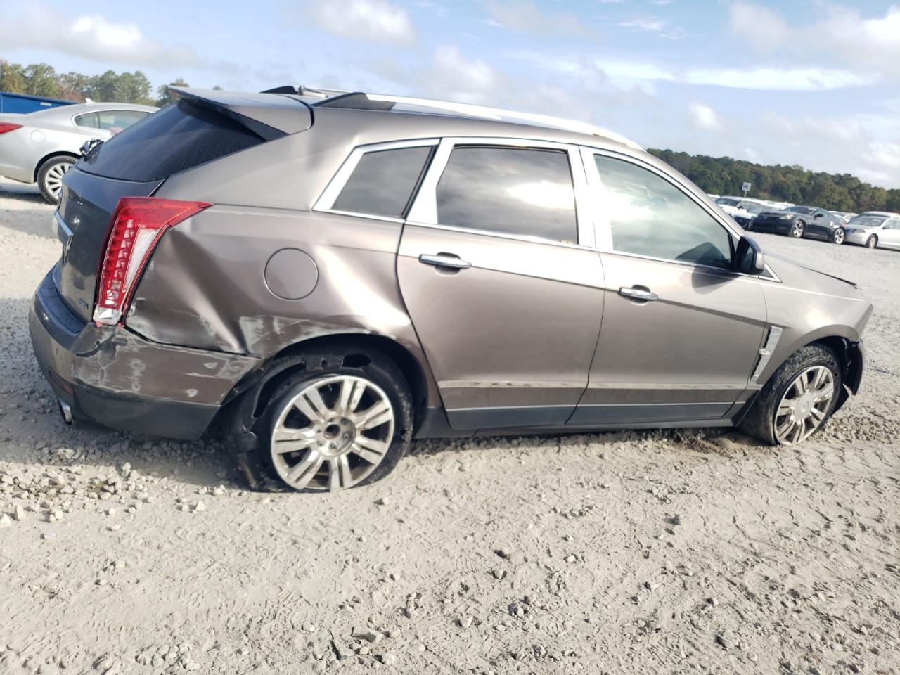 2012 Cadillac SRX VIN 3GYFNAE30CS502356 Copart auction photo, all over / undercarriage damage thumbnail 3