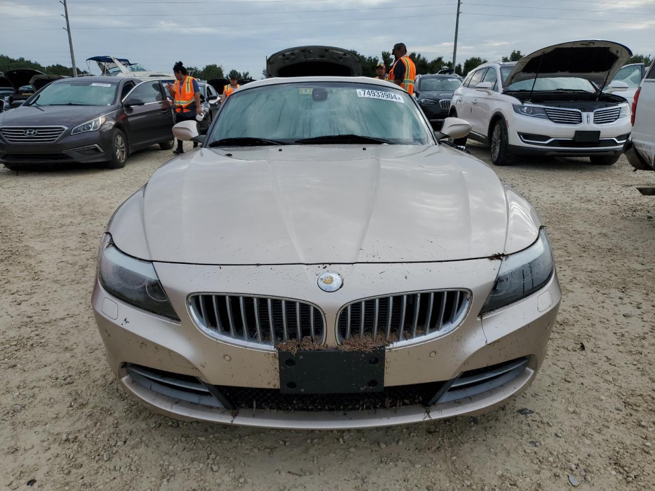 2012 BMW Z4 VIN WBALM7C5XCE384505 Copart auction photo, water/flood damage thumbnail 5