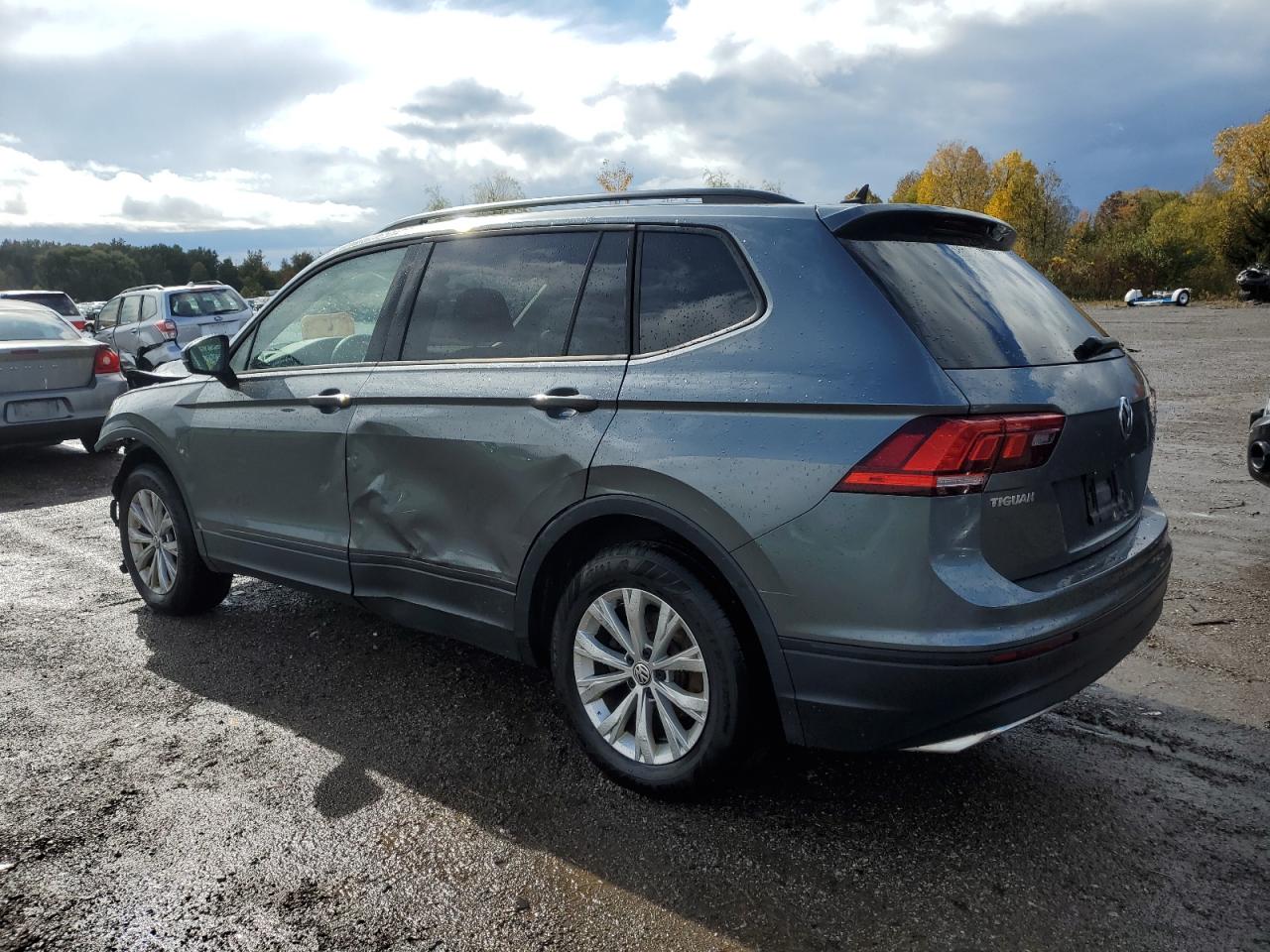 2020 Volkswagen Tiguan VIN 3VV0B7AX7LM142993 Copart auction photo, front end / side damage thumbnail 2
