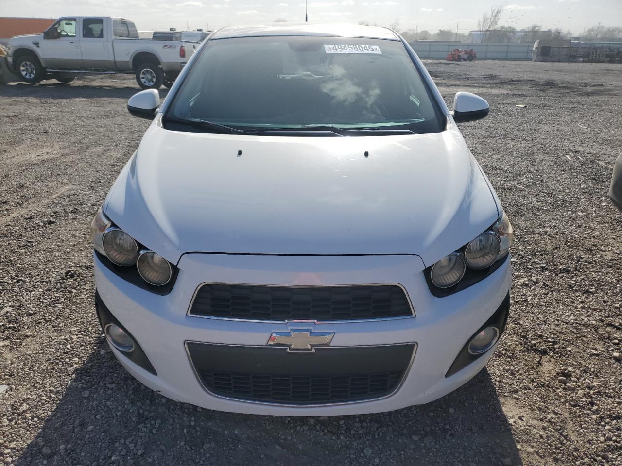 2012 Chevrolet Sonic VIN 1G1JC6SH2C4228119 Copart auction photo, side / rear end damage thumbnail 5