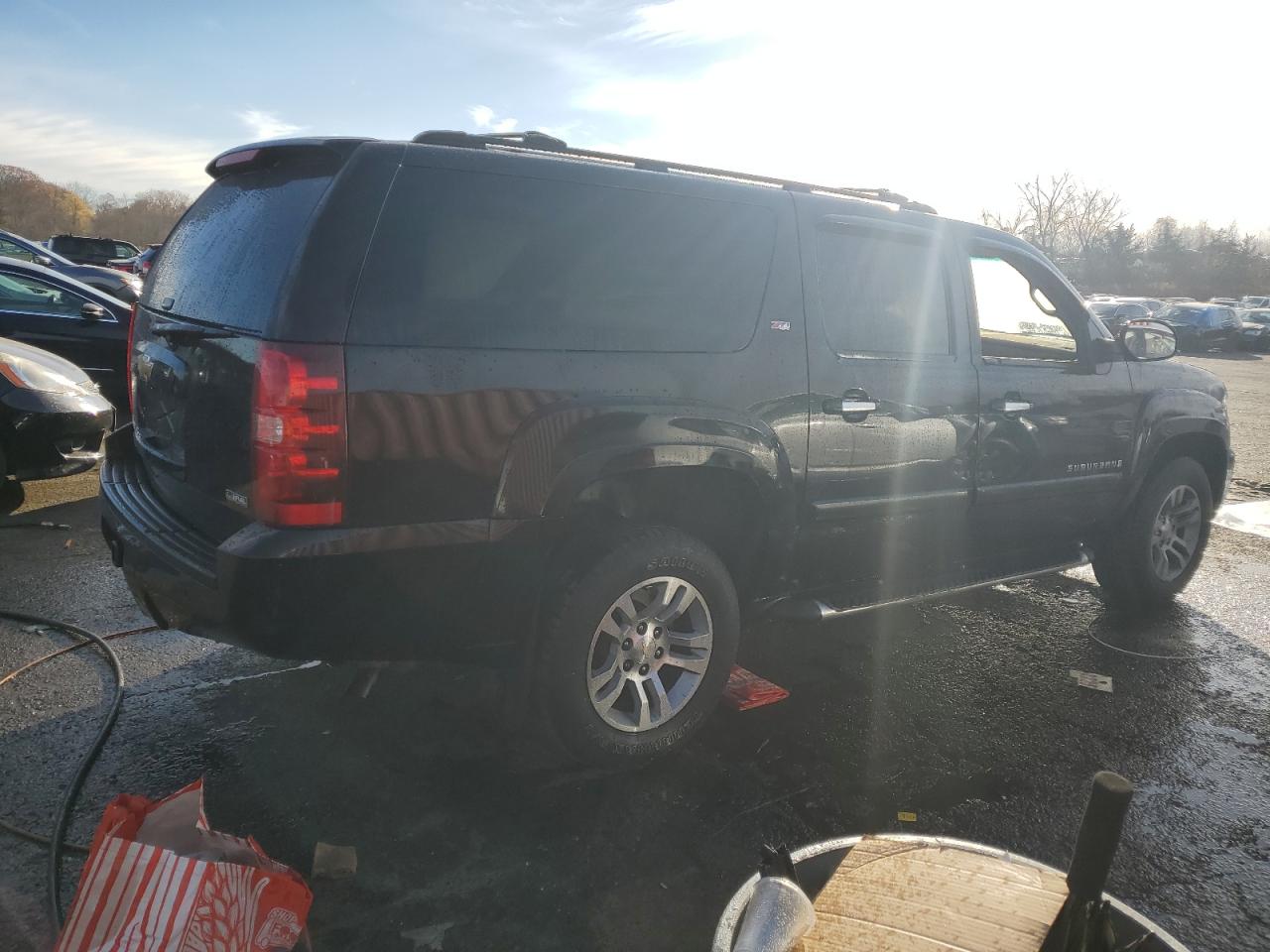 2007 Chevrolet Suburban VIN 3GNFK16387G230300 Copart auction photo, burn damage thumbnail 3