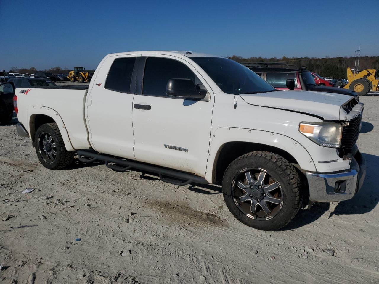 2016 Toyota Tundra VIN 5TFRM5F18GX098981 Copart auction photo, rear end / front end damage thumbnail 4