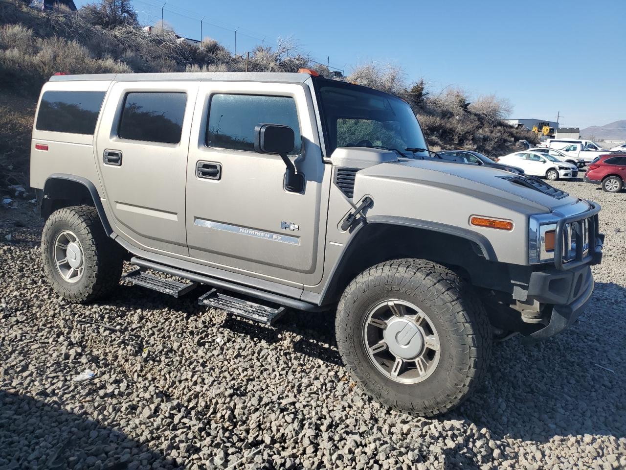 2003 Hummer H2 VIN 5GRGN23UX3H140703 Copart auction photo, rear end damage thumbnail 4