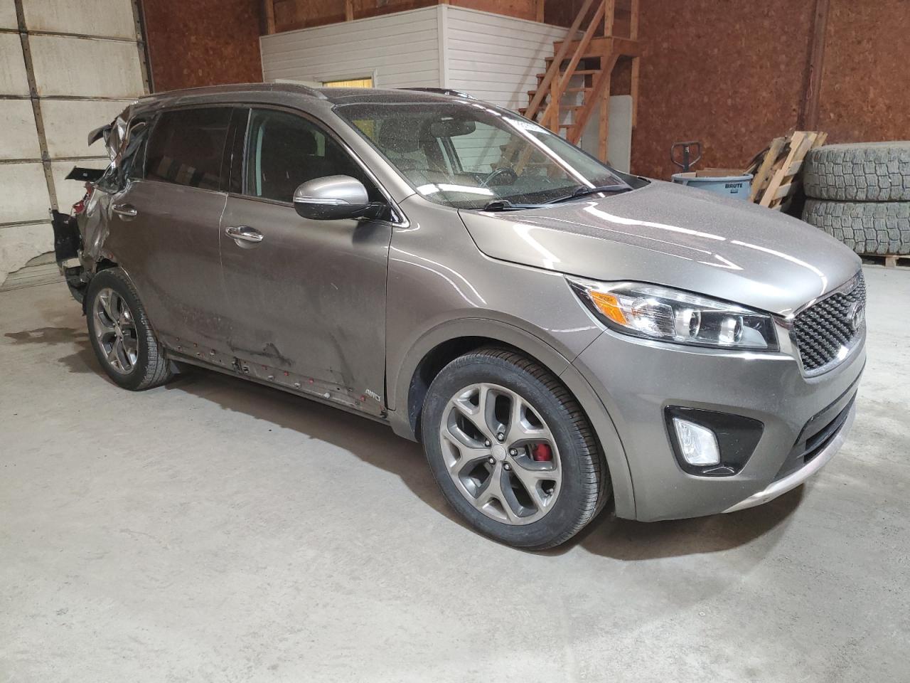 2016 KIA Sorento VIN 5XYPKDA59GG031228 Copart auction photo, rear end damage thumbnail 4