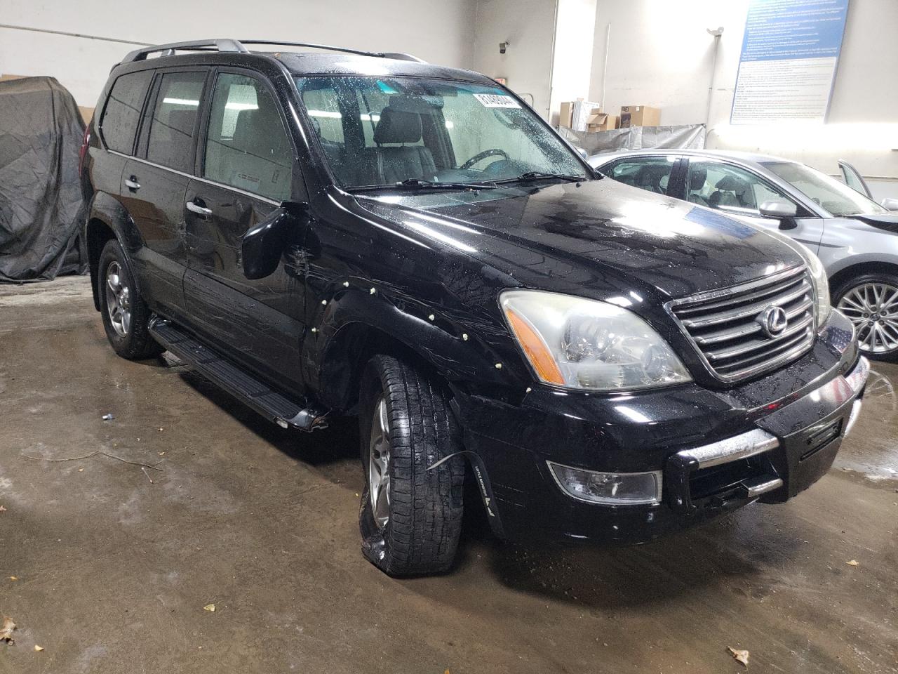 2009 Lexus GX VIN JTJBT20X990175379 Copart auction photo, side / front end damage thumbnail 4
