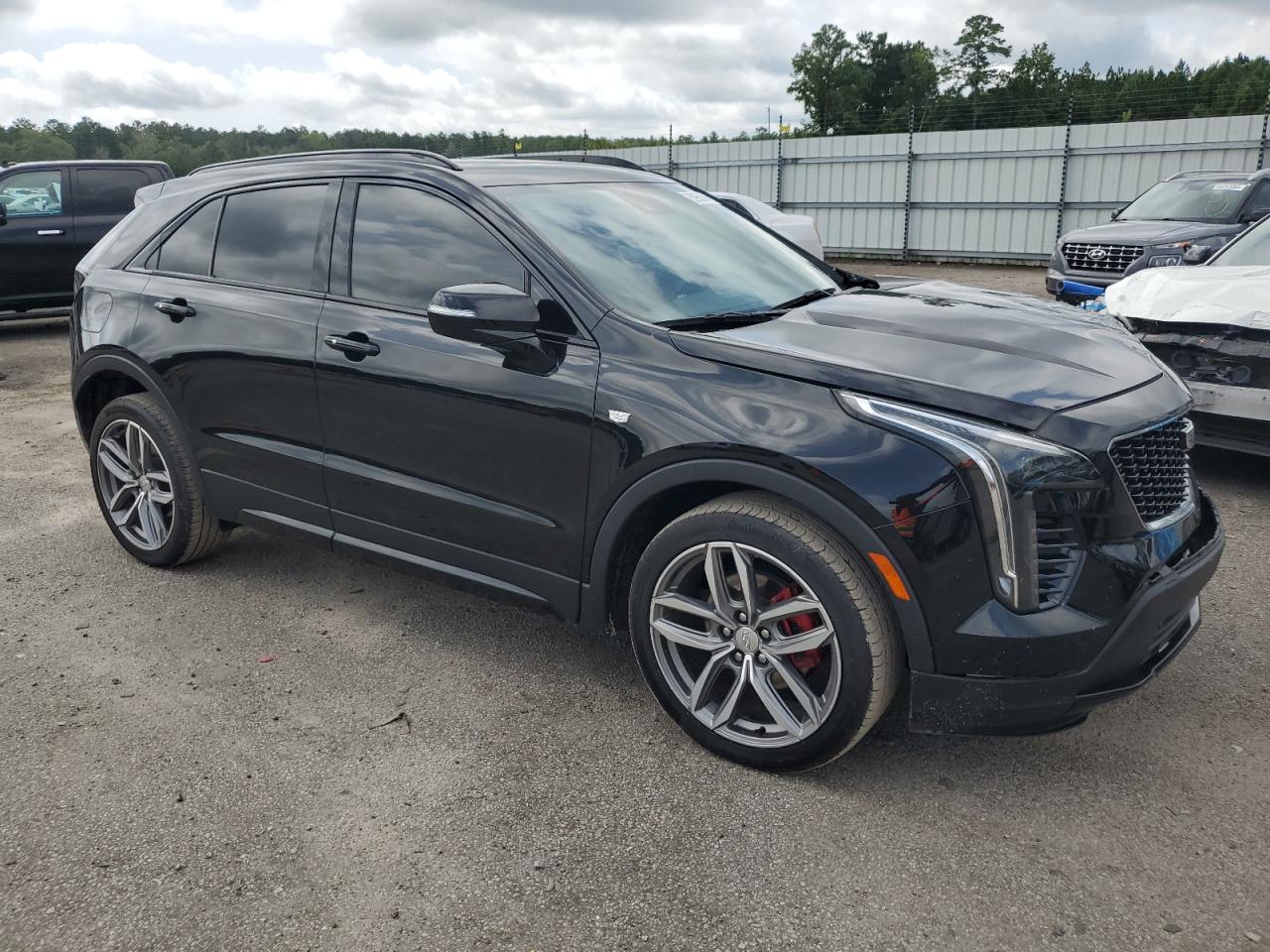 2021 Cadillac XT4 VIN 1GYFZER42MF024204 Copart auction photo, front end damage thumbnail 4
