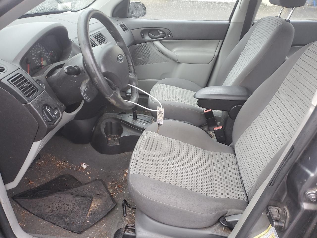 2006 Ford Focus VIN 1FAHP34N96W142512 Copart auction photo, all over damage thumbnail 7