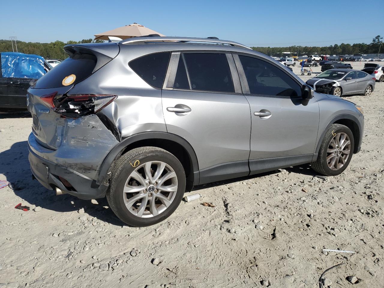 2015 Mazda CX-5 VIN JM3KE2DY2F0475641 Copart auction photo, rear end damage thumbnail 3